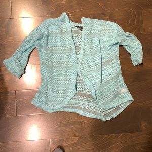 Baby blue women’s cardigan in Xl large for kids = Xs for adults.